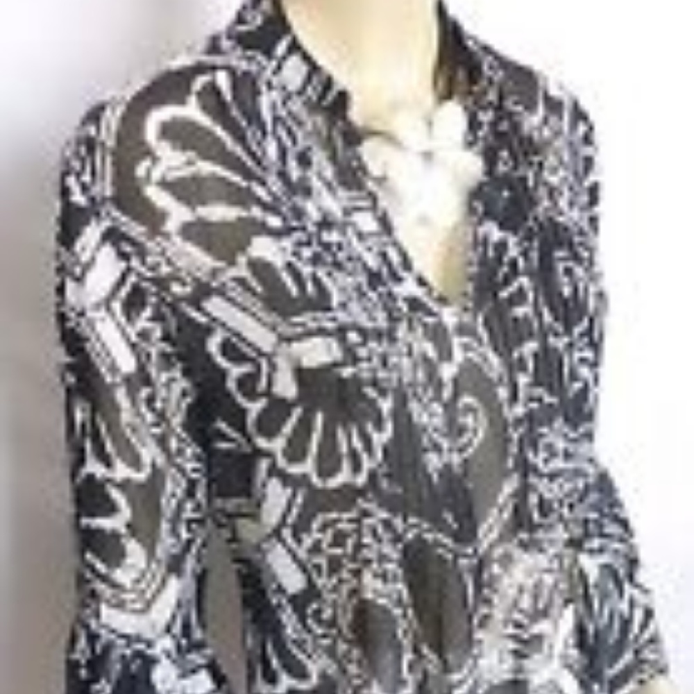 Cache' Shear black & white top with flare sleeves.